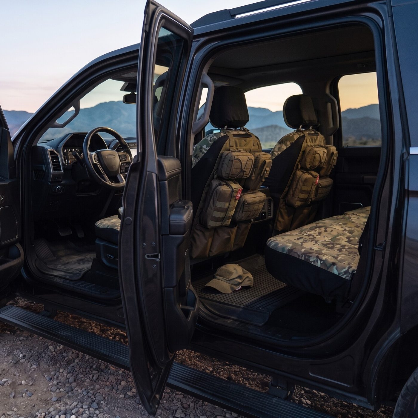 Truck with GruntCrate seat covers and organizers parked by a mountain road